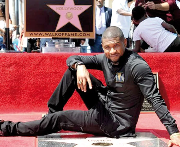 Recibe Usher su estrella