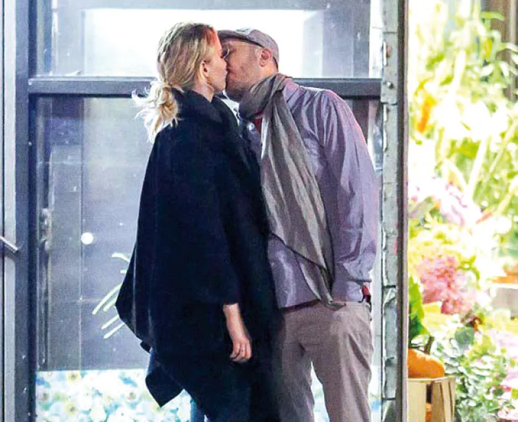 Jennifer Lawrence y Darren Aronosfy en pleno beso