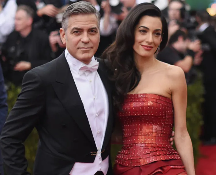 Va George Clooney contra fotógrafos