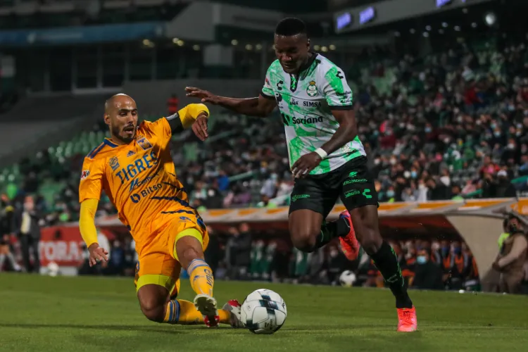 Tigres rescatan punto