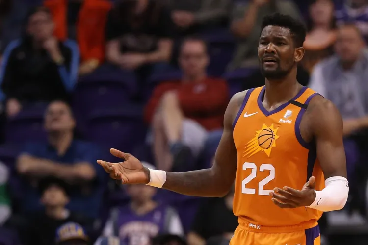 Ayton y Soles  en un receso